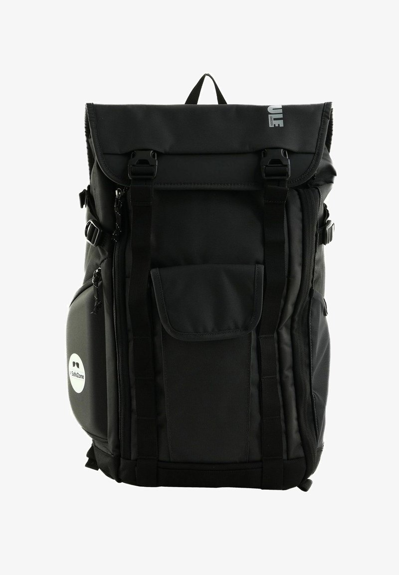 Black backpack made of durable fabric with a roll-top design, multiple pockets, adjustable straps, and a circular logo patch.