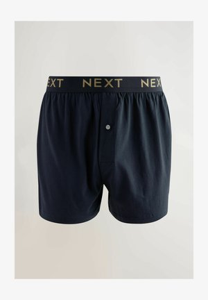 Navyblaue Baumwoll-Boxershorts verfügen über einen elastischen Bund mit "NEXT" in Gold, einen Knopfverschluss vorne und eine lockere Passform.