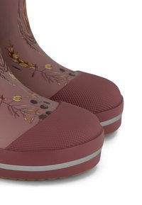 Maui värvi kummist vihmakeeled lillemustriga. Omavad tekstuuriga ümarat varvast, kontrastset talla hõbedase triibuga ja pehmet viimistlust.