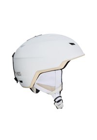 Witte skhelm met een gladde matte afwerking, verstelbare riemen en ventilatie-openingen. Bevat een beige accent langs de rand en labels.