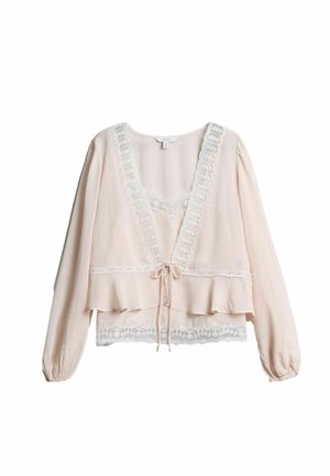 Hellrosa langärmlige Bluse mit Spitzenbesatz am Ausschnitt, an der Brust und am Saum, mit einer vorderen Schleife und leichtem Rüschensaum unten.