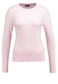 Maglione lavorato a maglia rosa chiaro con maniche lunghe, polsini a costine e scollo rotondo. Texture liscia con una silhouette aderente.
