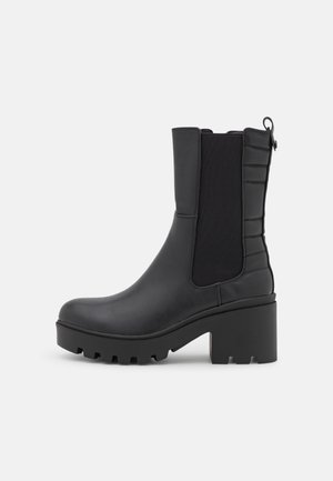 Platform ankle boots - black
