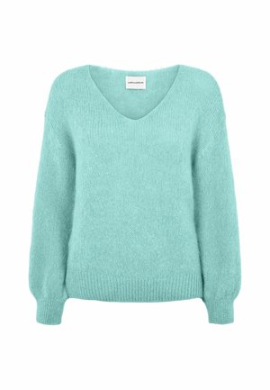 Pull en maille duveteuse bleu clair avec manches longues et col en V, présenté sur un fond blanc uni. Aucune personne présente.