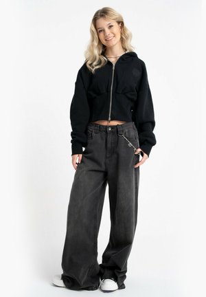 - Jeansy Relaxed Fit