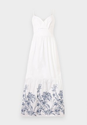 Weißes Baumwoll-Maxikleid mit tailliertem Oberteil und Spaghettiträgern. Mit blauer floralem Stickerei entlang dem Saum und gerafftem Rock.