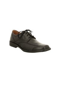 Schwarze Leder-Halbschuhe mit abgerundeter Spitze, Schnürdesign, detaillierter Naht und niedrigem Absatz. Glatte Textur mit minimalen Akzenten.