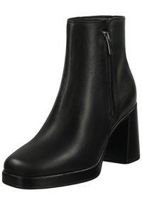 Botín negro de tobillo hecho de cuero suave, con cremallera lateral, punta redondeada y un tacón alto grueso. Diseño simple y elegante.
