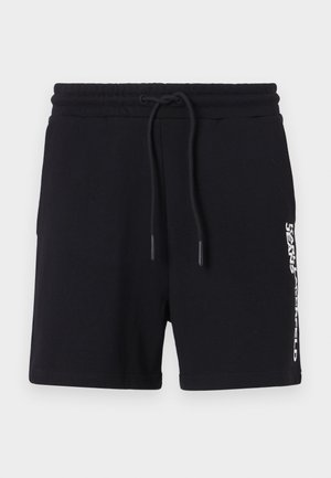 Črne bombažne kratke hlače z vrvico v pasu, z belim logotipom na strani in gladko teksturo. Klasična zasnova.