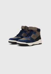 High-top sneakers featuring a mix of navy and gray suede, textile accents, contrasting white midsole, and an adjustable strap.