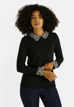 EN IMPRIMÉ LÉOPARD - Blouse - noir
