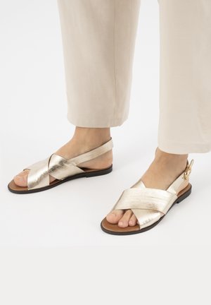 Sandals - gold coloured