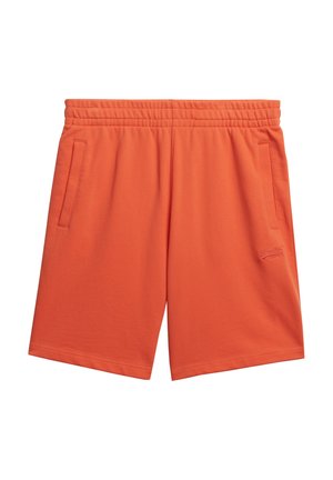Oranje katoenen sportshorts met een elastische tailleband, twee zijzakken en een klein logo aan de linkerkant.