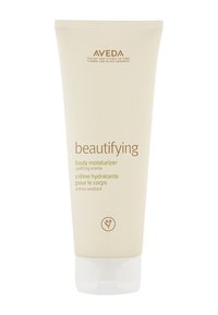 Aveda Beautifying Körperfeuchtigkeitscreme in einer cremefarbenen Tube, mit braunem Text und floralem Logo, ausgestattet mit einem Klappdeckel.