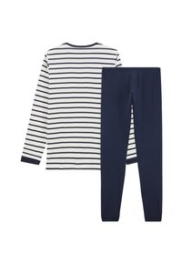 Randig långärmad skjorta i marinblått och vitt, matchad med enfärgade marinblå leggings. Mjuk bomullstyg, avslappnad passform, minimalistisk design.