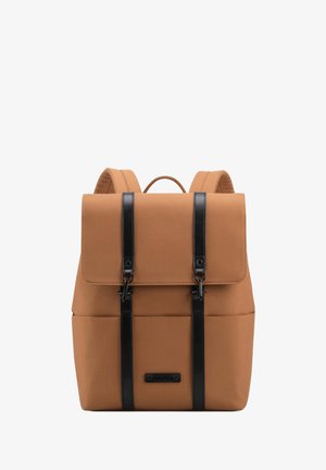 Brown fabric backpack with a flap, black leather straps, and metallic clasps. Features a top handle and front pocket with logo.