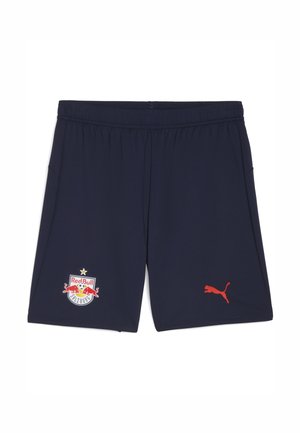 Shorts de sport marine fabriqués en tissu léger. Présentent un logo de Red Bull Salzburg et un logo rouge de Puma sur le bas à droite. Taille élastique.