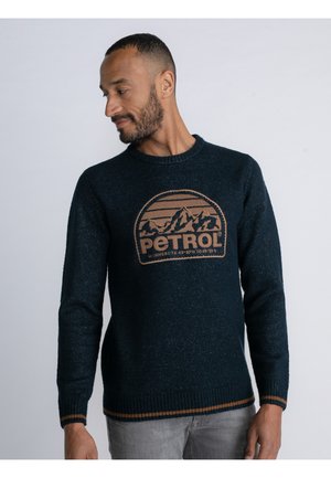 Marineblauer Strickpullover mit Rundhalsausschnitt und einer Berggrafik in Hellbraun. Verfügt über gerippte Bündchen und Saum mit Akzentstreifen.