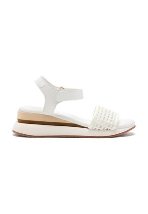 Sandal bianca con cinturino intrecciato, cinturino alla caviglia regolabile e suola a zeppa bassa a strati in diverse tonalità di kaki e bianco.