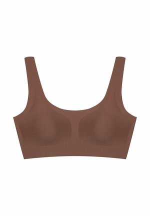 Brown seamless bra with wide straps, featuring a smooth texture and contoured cups for support, set against a white background.