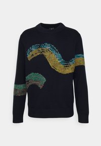 Pull bleu marine à col rond, avec des motifs ondulés colorés en bleu sarcelle, jaune et vert sur le devant et les manches. Confectionné en tissu tricoté.