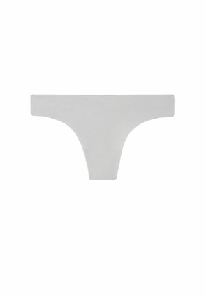 White cotton thong with a low-rise waistband and minimal rear coverage. Smooth texture, no additional patterns or embellishments.