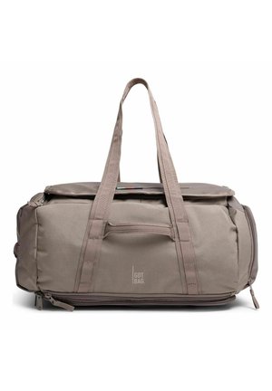 Borsa da viaggio rettangolare beige con doppio manico, tasca frontale con cerniera, scomparto laterale con cerniera e logo "GOT BAG." centrato sul pannello frontale.