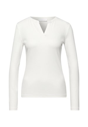 Haut blanc à manches longues en maille côtelée avec un décolleté en forme d’encoche en V, silhouette ajustée, sans motifs ni ornements visibles.