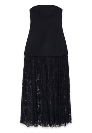 Black strapless dress with a fitted bodice and a flowing lace skirt. The bodice is smooth, complementing the textured lace overlay.