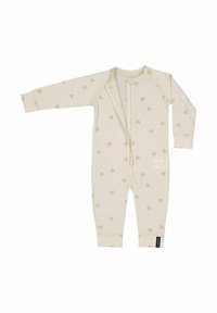 Krämfärgad babyoverall med långa ärmar, beige hjärtmönster och en dragkedja fram som är något öppen.