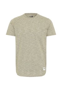 Lys grøn kortærmet t-shirt med rund hals, let buet kant og en tekstureret, meleret stof. Lille mærke med logo på kanten.