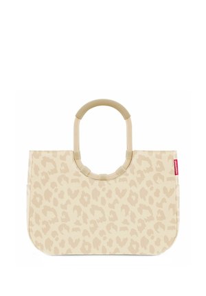 Beige tote bag with light leopard spots pattern, round padded handles, and a small red brand tag on the side.