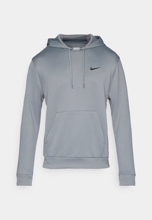 Heled hõbedane kapuutsiga dressipluus, millel on ees tasku, reguleeritav paelakott ja must Nike logo vasakul rinnal. Pehme, sile kangas ribadega mansettidega.