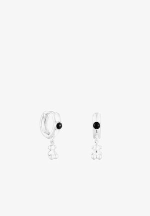 Silver hoop earrings with black onyx accents, featuring a dangling teddy bear charm. Smooth surface and polished finish.