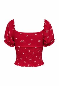 Blouse rouge courte avec manches courtes bouffantes, petit imprimé floral blanc, encolure carrée et taille froncée avec ourlet à volants.