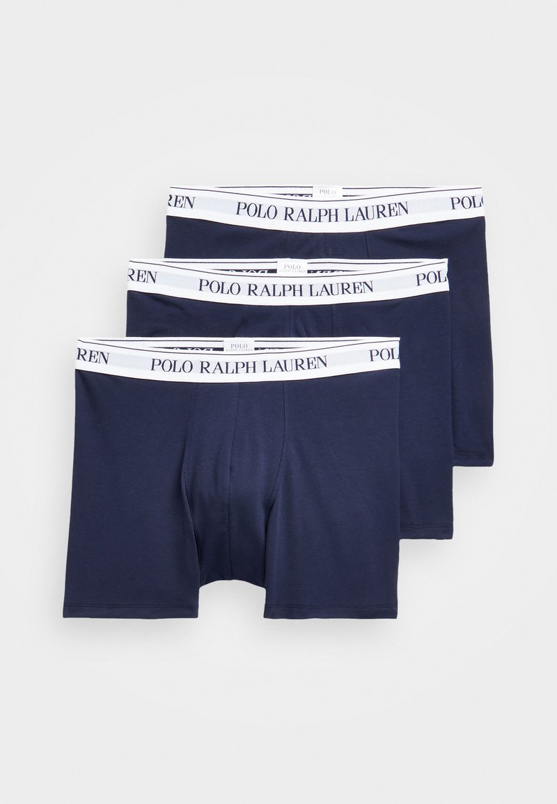 Pachet de trei boxeri navy blue, confecționați dintr-un material moale, având un elastic alb cu logo-ul "POLO RALPH LAUREN" în negru.