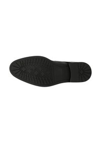 Suola di scarpa in gomma nera con un pattern testurizzato che presenta elementi circolari e lineari. Bordi lisci e leggero incavo per il comfort.