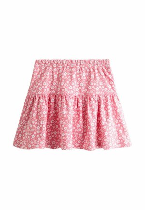 Falda rosa de capas con estampado floral blanco y cintura elástica, diseñada para uso casual.