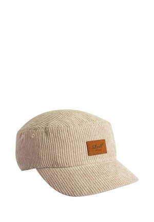 Beige ribbed fabric cap with a flat crown and a curved brim, featuring a small brown leather patch with embossed text on the front.