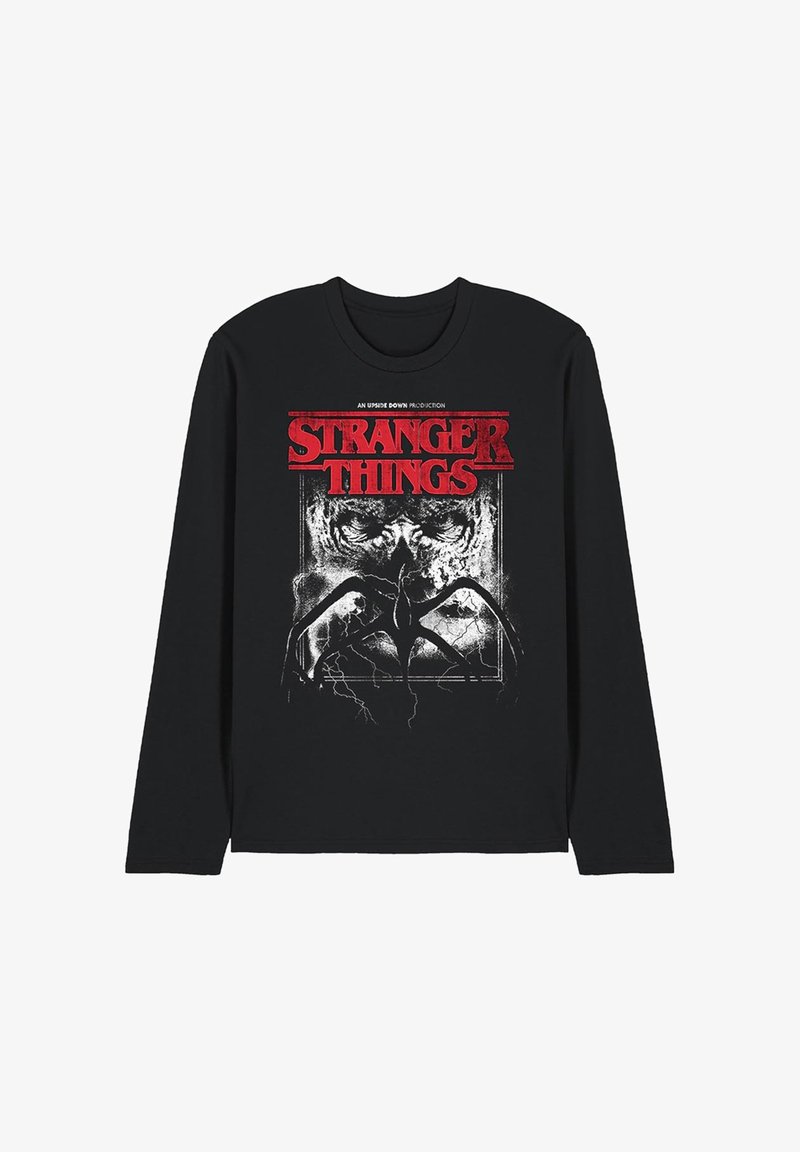 Schwarz mit langen Ärmeln T-Shirt mit einem grafischen Druck, auf dem "Stranger Things" in Rot und eine detaillierte Illustration eines Wesens zu sehen ist.