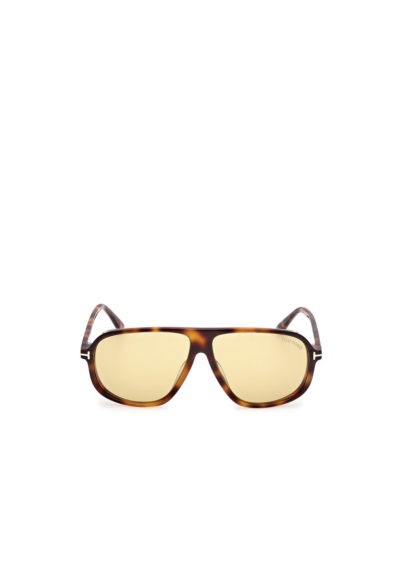 Occhiali da sole tartarugati con montatura rettangolare, lenti gialle e logo discreto sul lato. Bracci testurizzati per una migliore presa.