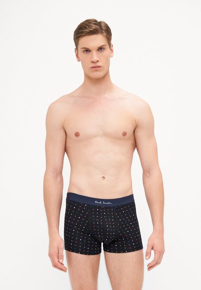 Boxer shorts navy à pois multicolores, coupe ajustée, en coton doux, avec une taille élastique affichant le nom de la marque de manière bien visible.