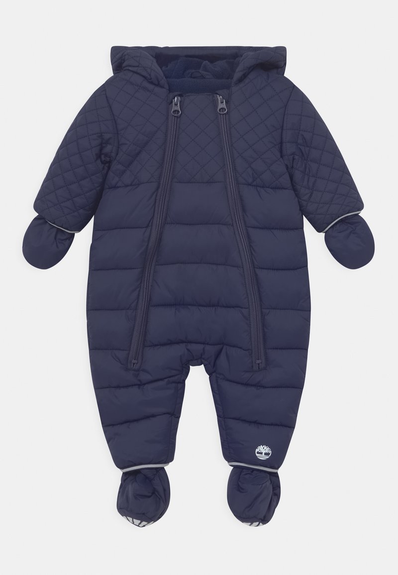 Combinaison de neige pour bébé matelassée bleu marine avec capuche matelassée, moufles et chaussons attachés, et double fermeture éclair à l'avant.