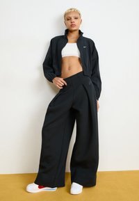 Nike Sportswear SPORTSWEAR TECH FLEECE - Treniņtērpa apakšdaļas - black