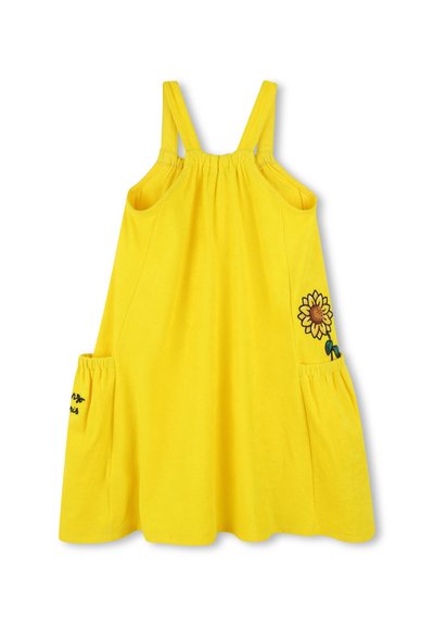 Geel katoenen zomerjurk met verstelbare schouderbanden, gestructureerde halslijn, zonnebloem borduursel op de zak en een uitlopende rok met plooien.