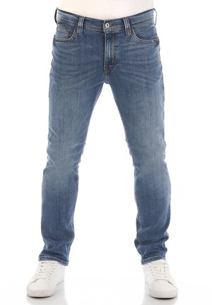Jeans in denim blu scuro con una vestibilità slim, caratterizzati da un classico design a cinque tasche, dettagli di cucitura sottili e una chiusura con cerniera.
