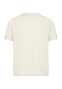 Short sleeve, crew neck t-shirt in off-white. Made of soft cotton, features a straight cut with a smooth texture and no patterns.