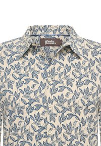 Koszula z krótkim rękawem w kolorze kremowym z granatowym wzorem liści, z kołnierzykiem w szpic i guzikami, wykonana z lekkiego materiału.
