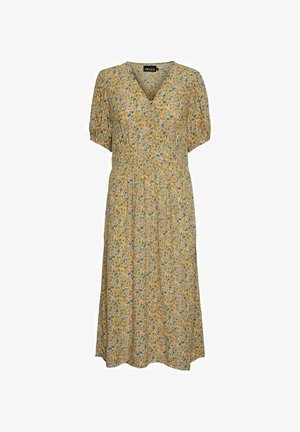 Květinové šaty ze žluté tkaniny s krátkými rukávy a výstřihem do V. Mají nařasený pas a splývavou sukni délky ke kolenům. Malé vícebarevné květiny.