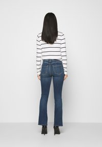 Marks & Spencer Calças de ganga à boca de sino - blue denim